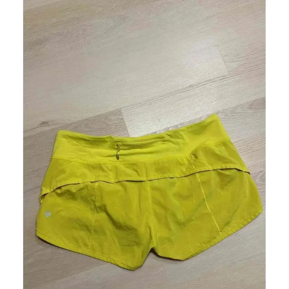 Lululemon Speed Up Casual Shorts Womens Yellow Zipper Front Pockets Size 6